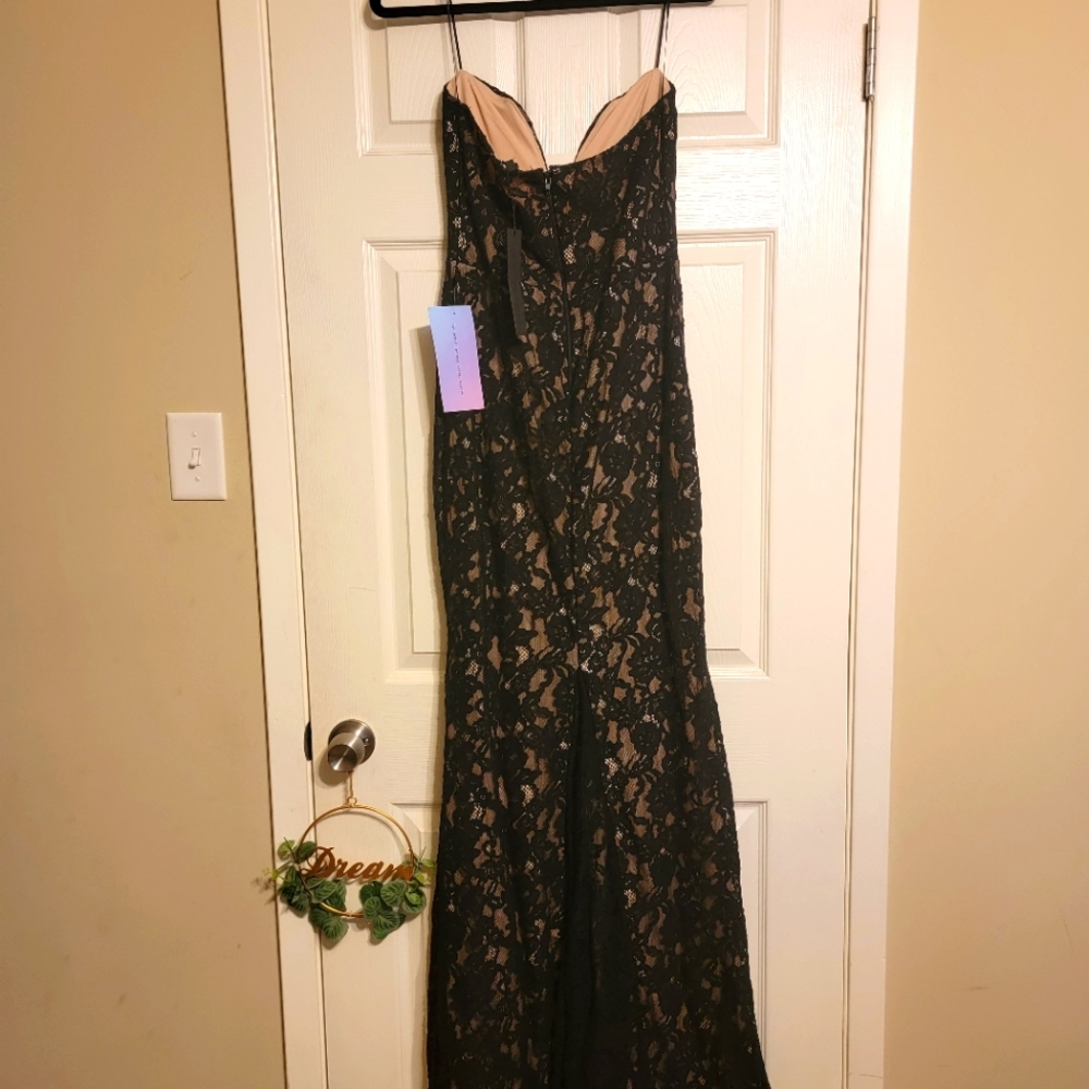 Formal black lace evening dress.